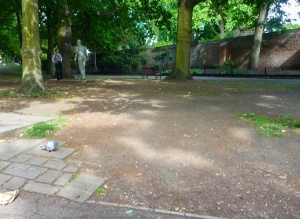 Eroded ground around the Walking Man statue